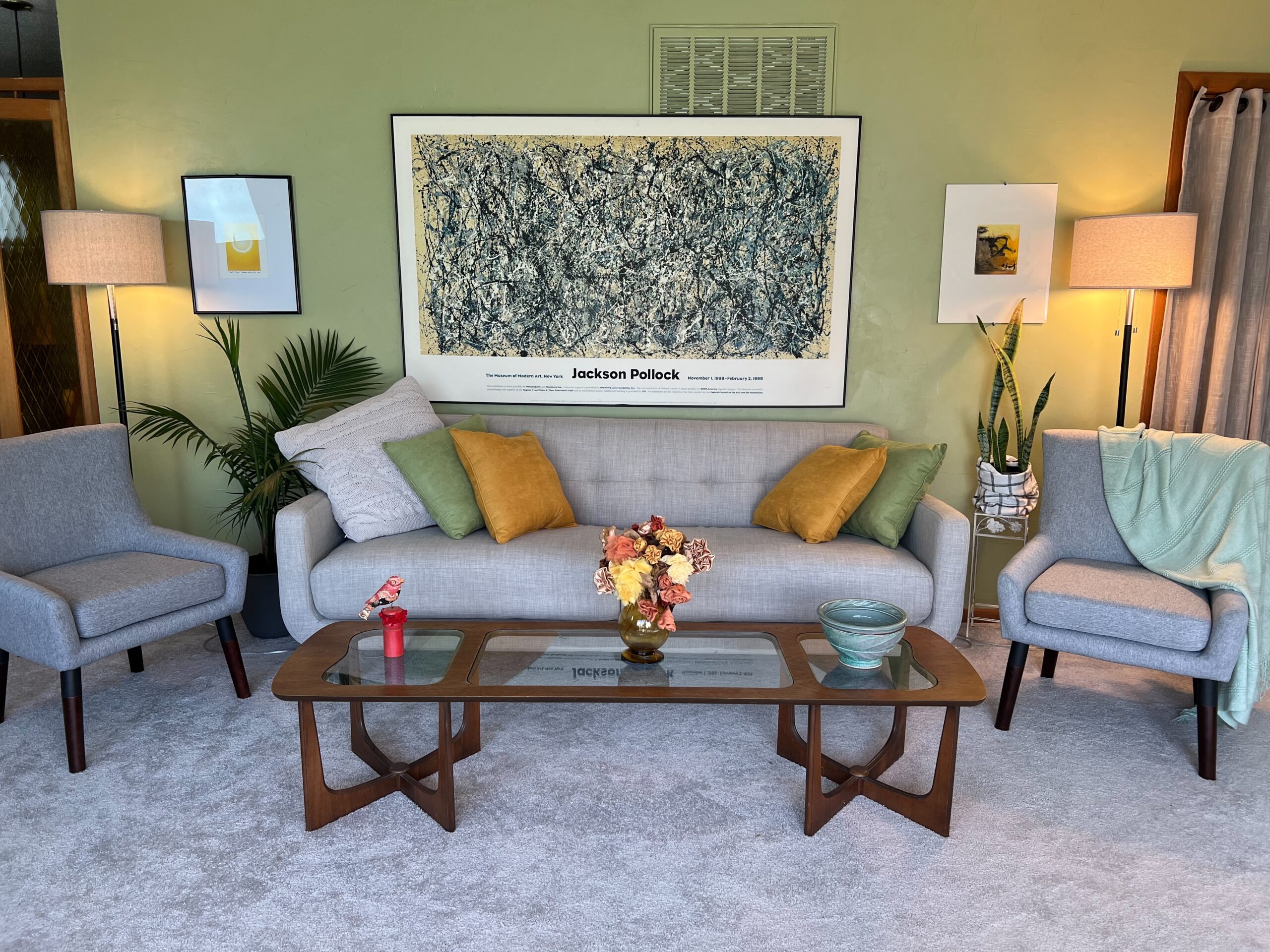 BQH Immersion main gathering space, livingroom with couch and coffee table